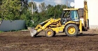 Выравнивание рельефа в Сосновом Боре в октябре